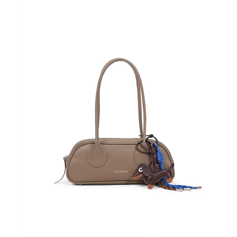 New style fashion handbag, fashionable and easy to match, made of PU leather, underarm bag with pendant