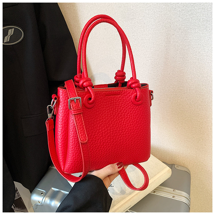 Fashionable and simple solid color handbag, versatile retro bucket bag shoulder messenger bag