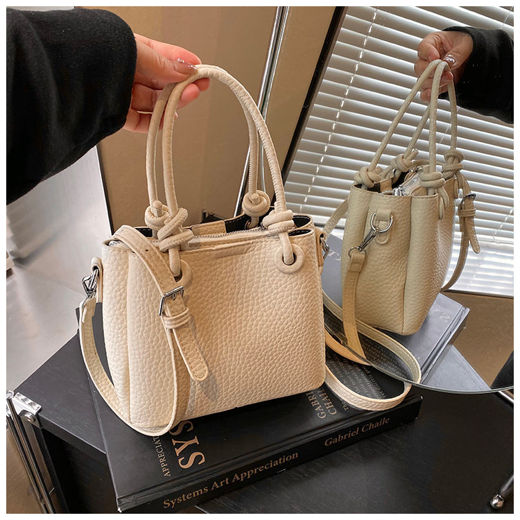 Fashionable and simple solid color handbag, versatile retro bucket bag shoulder messenger bag