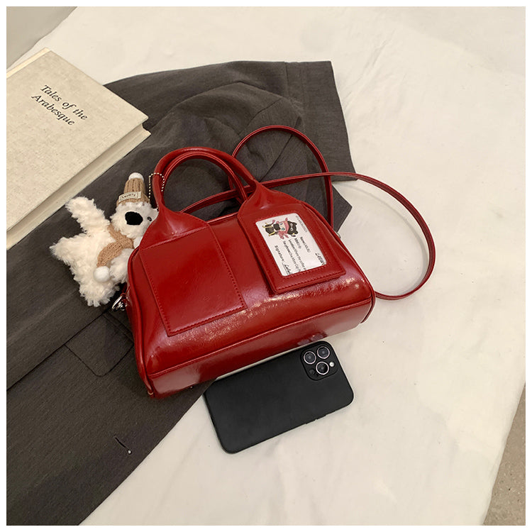 Cute solid color shiny women's handbag, large capacity rest shoulder messenger bag