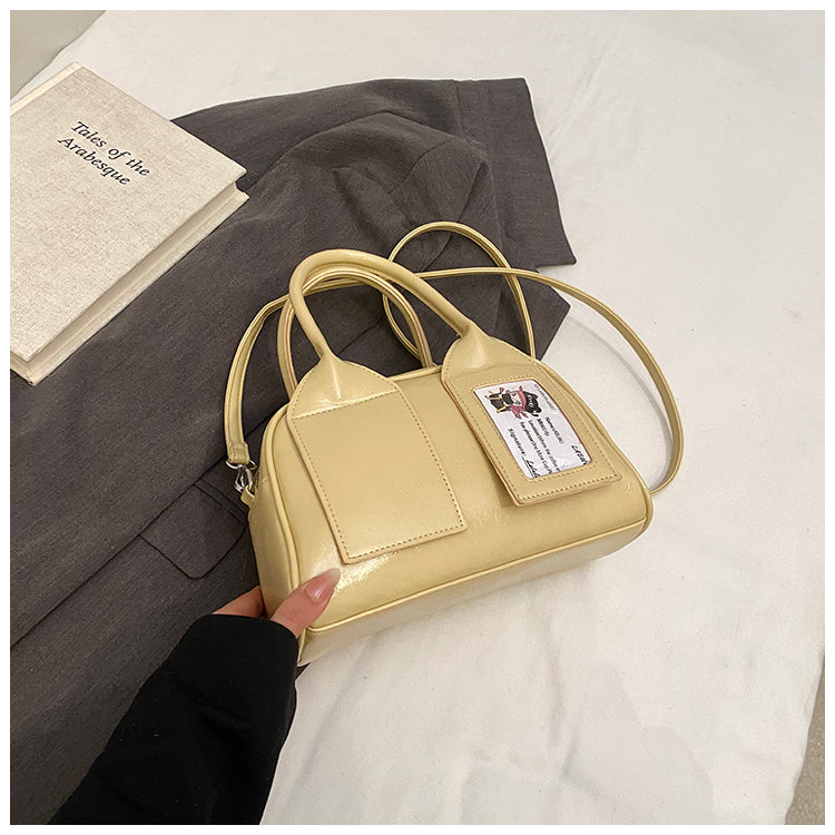 Cute solid color shiny women's handbag, large capacity rest shoulder messenger bag