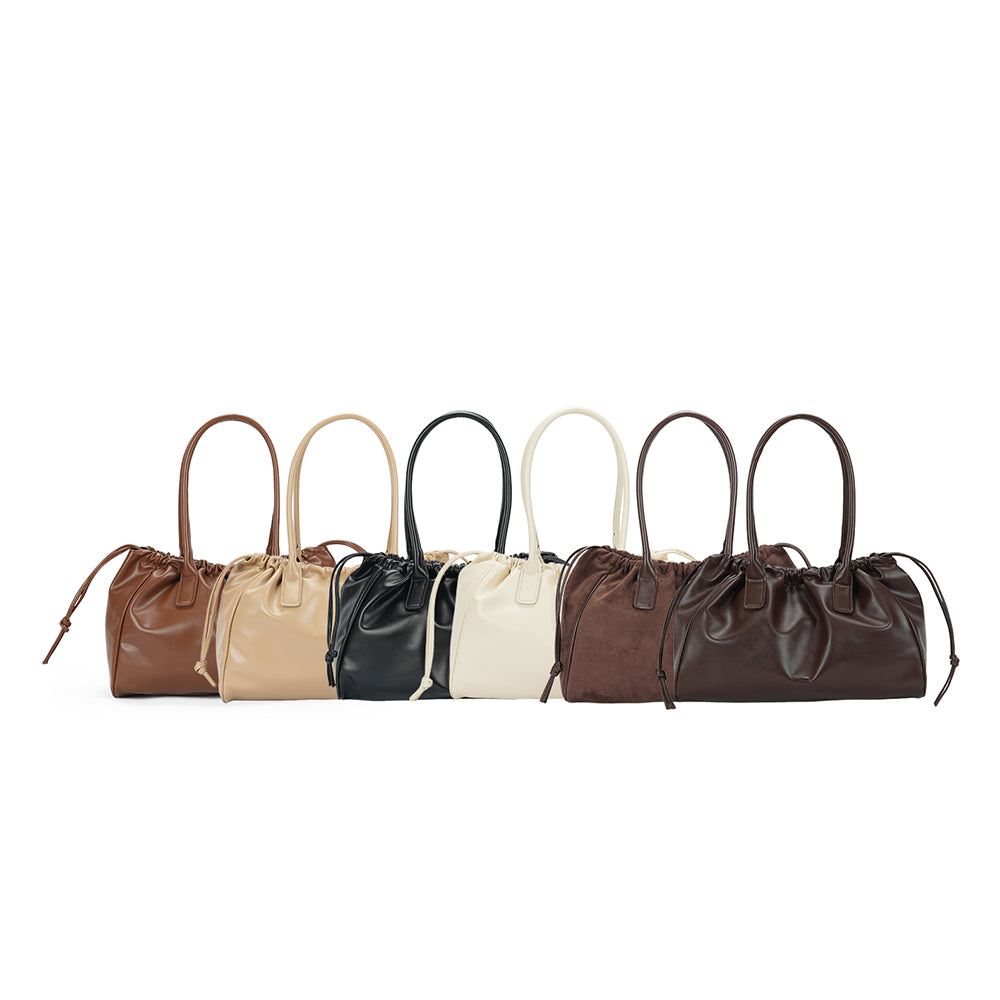 (COCOTAYA)Stylish and versatile leather drawstring tote bag with frosted finish.