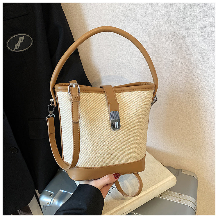 Fashionable handbags, simple and casual bucket bags for women, new contrasting color commuter shoulder bags.