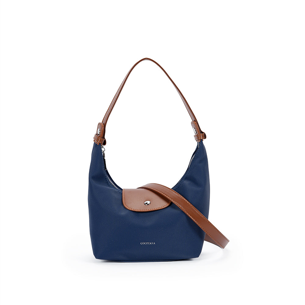 (COCOTAYA)Vintage leather underarm bag with delicate zipper and magnetic closure.