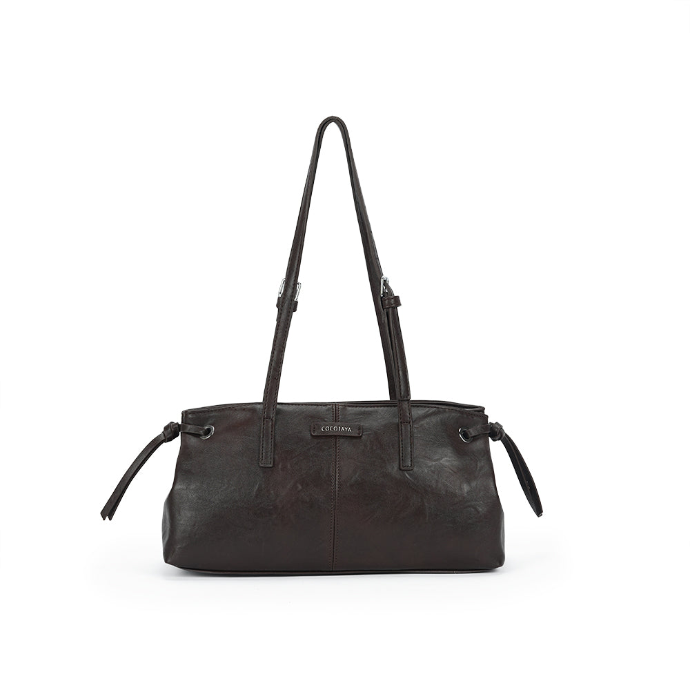 (COCOTAYA)Vintage-style drawstring tote bag in waxed leather with a suede finish.