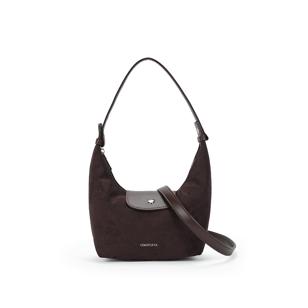 (COCOTAYA)Vintage leather underarm bag with delicate zipper and magnetic closure.